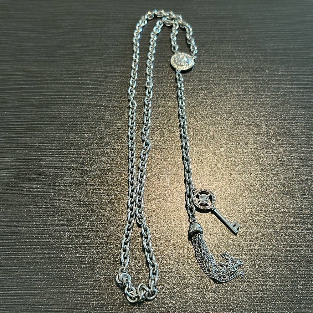 NWOT silver necklace with key and tassel